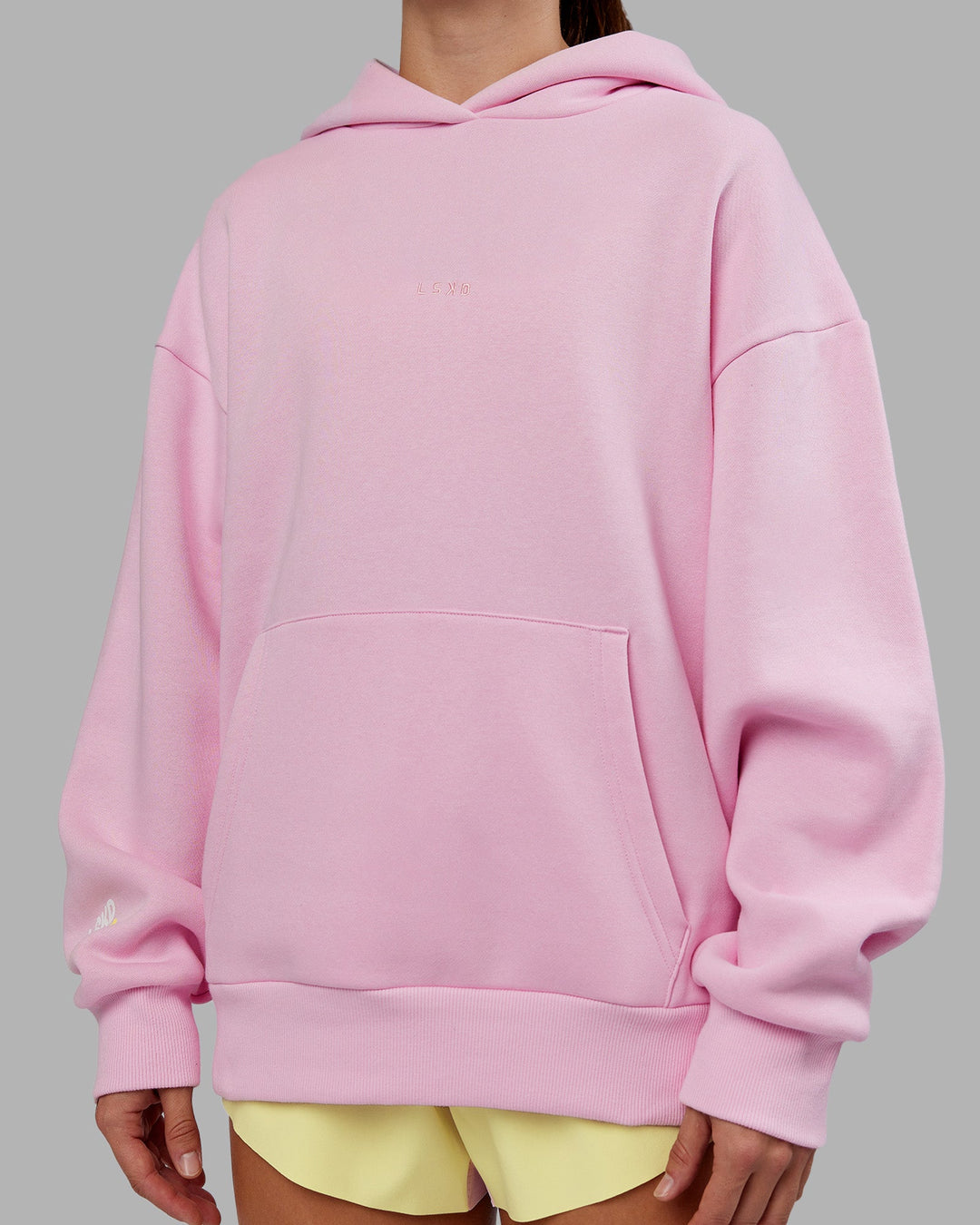 Woman wearing Your Race Oversized Hoodie - Marshmallow | Model:Grace | Size:XS