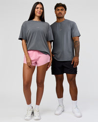 Duo wearing Built On Values FLXCotton Oversized Tee - Dark Storm Washed-Pink Rose | Model:Xav | Size:L | Model:Rhiley | Size:XS