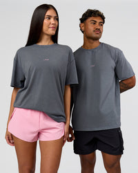 Duo wearing Built On Values FLXCotton Oversized Tee - Dark Storm Washed-Pink Rose | Model:Xav | Size:L | Model:Rhiley | Size:XS