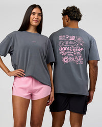 Duo wearing Built On Values FLXCotton Oversized Tee - Dark Storm Washed-Pink Rose | Model:Xav | Size:L | Model:Rhiley | Size:XS