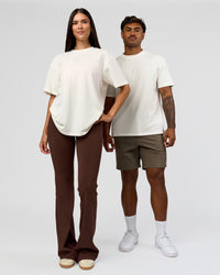 Duo wearing Built On Values FLXCotton Oversized Tee - Off White-Pink Rose | Model:Xav | Size:L | Model:Rhiley | Size:XS