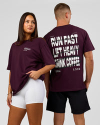 Duo wearing Coffee Run FLXCotton Oversized Tee - Cherry Lacquer-Black | Model:Albert | Size:M | Model:Bianca | Size:XS | Thumbnail Index: 0
