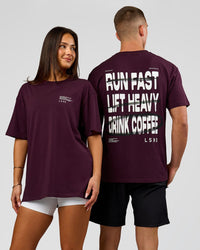 Duo wearing Coffee Run FLXCotton Oversized Tee - Cherry Lacquer-Black | Model:Albert | Size:M | Model:Bianca | Size:XS | Thumbnail Index: 0