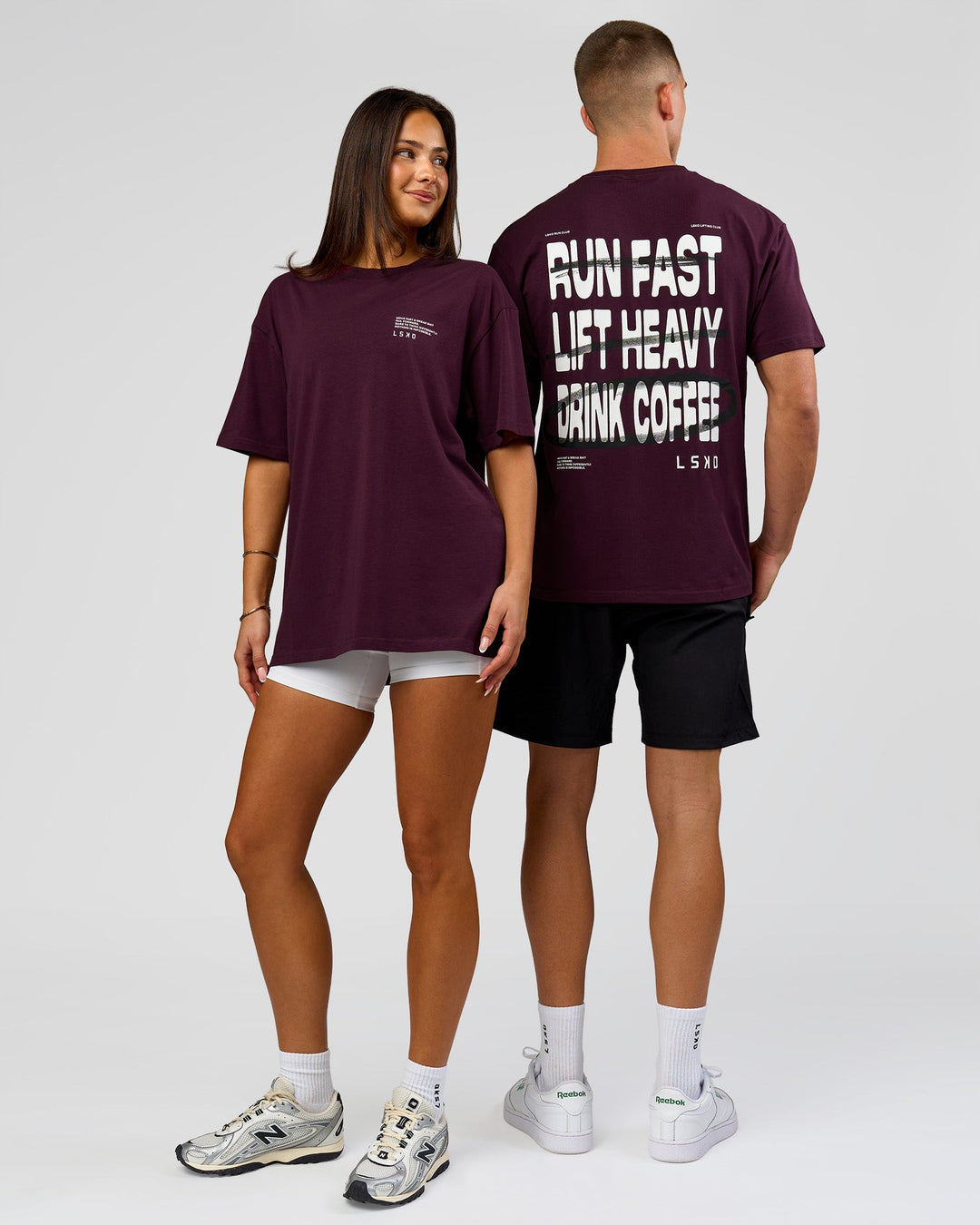 Duo wearing Coffee Run FLXCotton Oversized Tee - Cherry Lacquer-Black | Model:Albert | Size:M | Model:Bianca | Size:XS - view 6