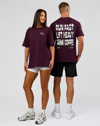 Duo wearing Coffee Run FLXCotton Oversized Tee - Cherry Lacquer-Black | Model:Albert | Size:M | Model:Bianca | Size:XS | Thumbnail Index: 5