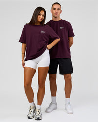 Duo wearing Coffee Run FLXCotton Oversized Tee - Cherry Lacquer-Black | Model:Albert | Size:M | Model:Bianca | Size:XS | Thumbnail Index: 6