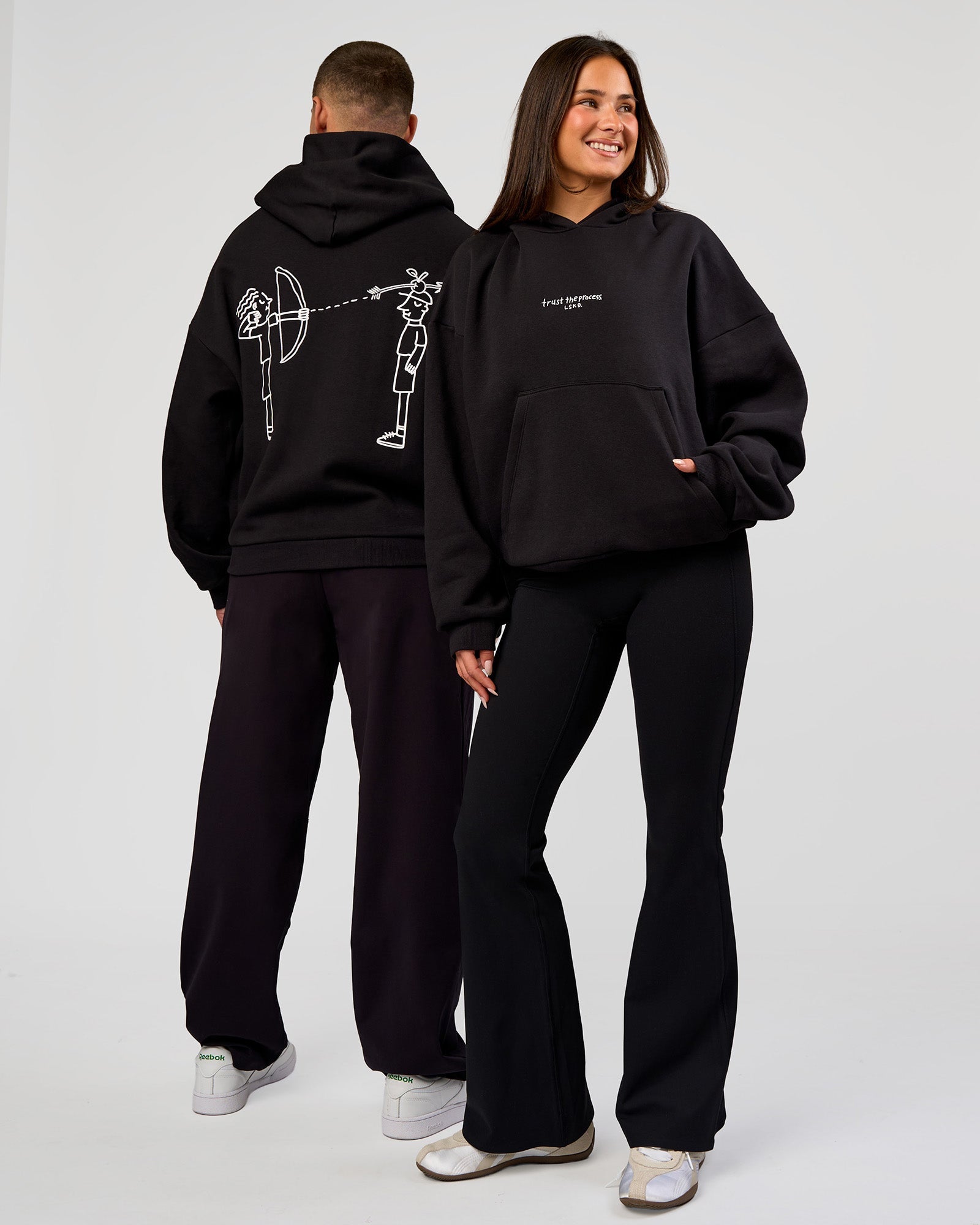Duo wearing Andrew J. Steel x LSKD Boxy Hoodie - Black | Model:Bianca | Size:S | Model:Jaiden | Size:L