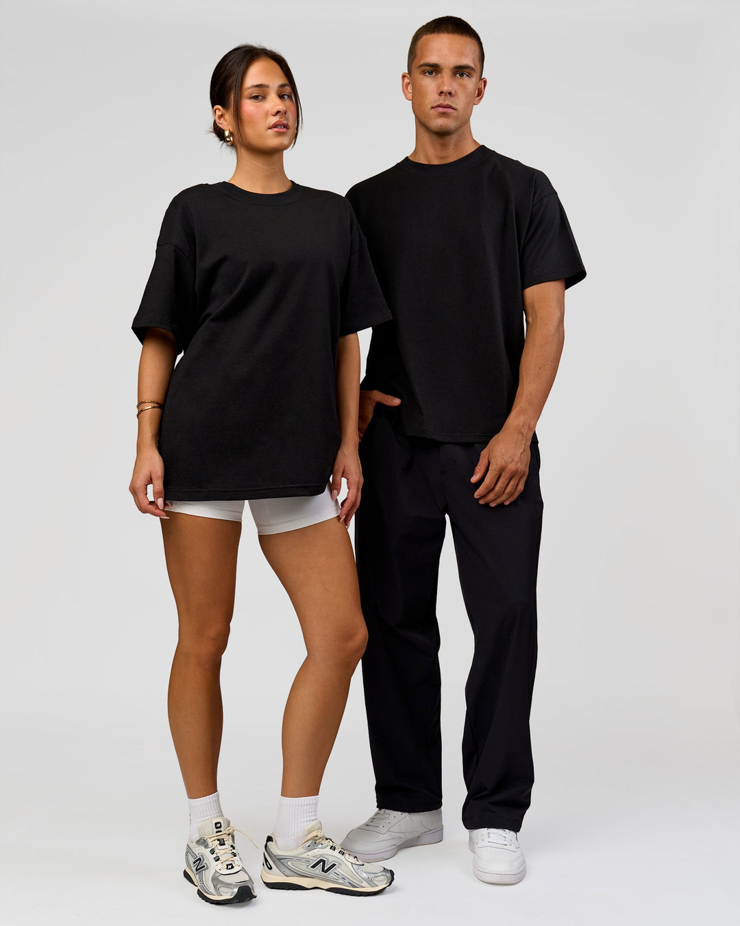 Duo wearing Tonal Legacy Heavyweight Oversized Tee - Black-Black | Model:Bianca | Size:XS | Model:Albert | Size:M - view 10