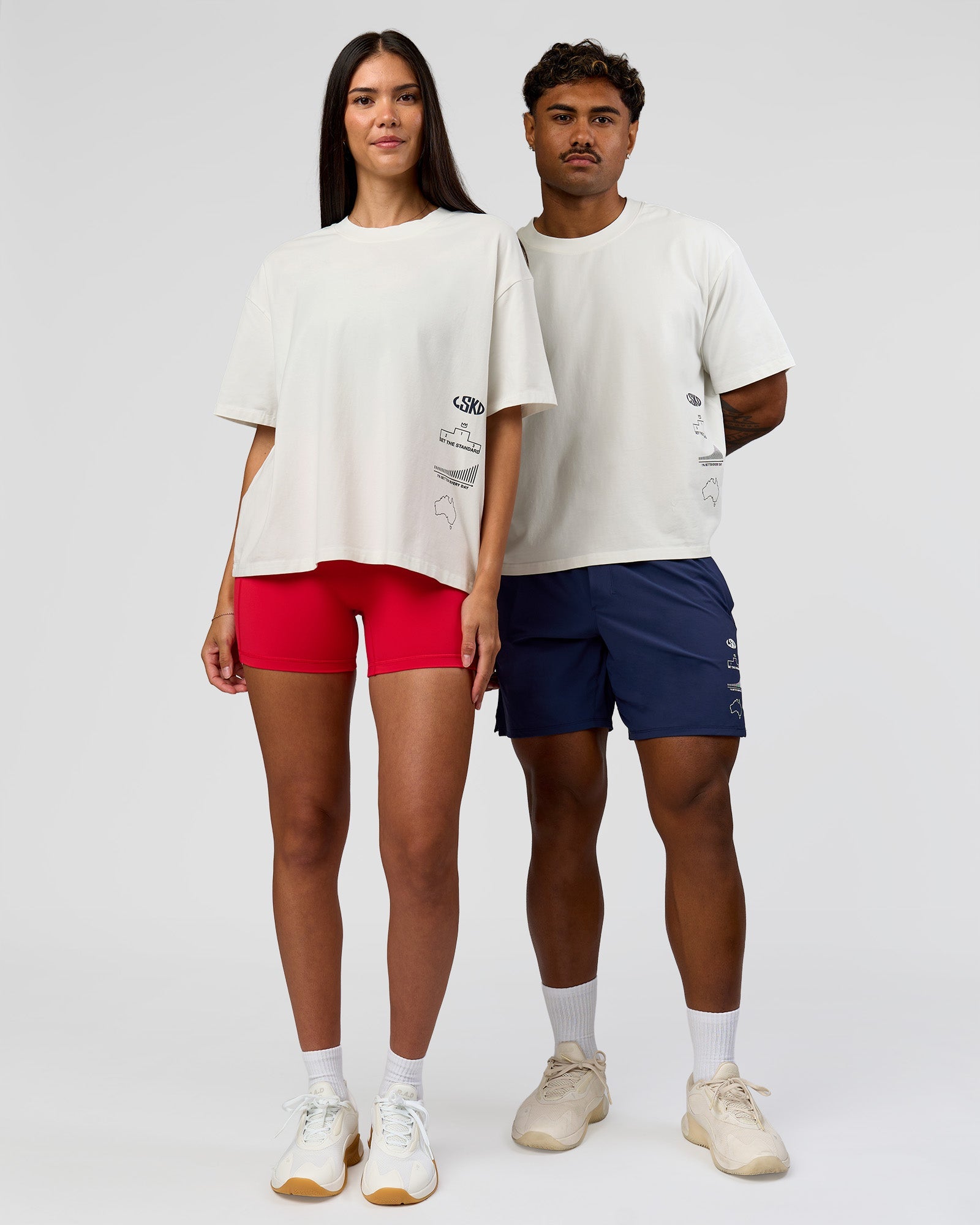 Duo wearing Greatest of All Time Heavyweight FLXCotton Boxed Tee - Off White Washed | Model:Rhiley| Size:XS | Model:Xav | Size:L