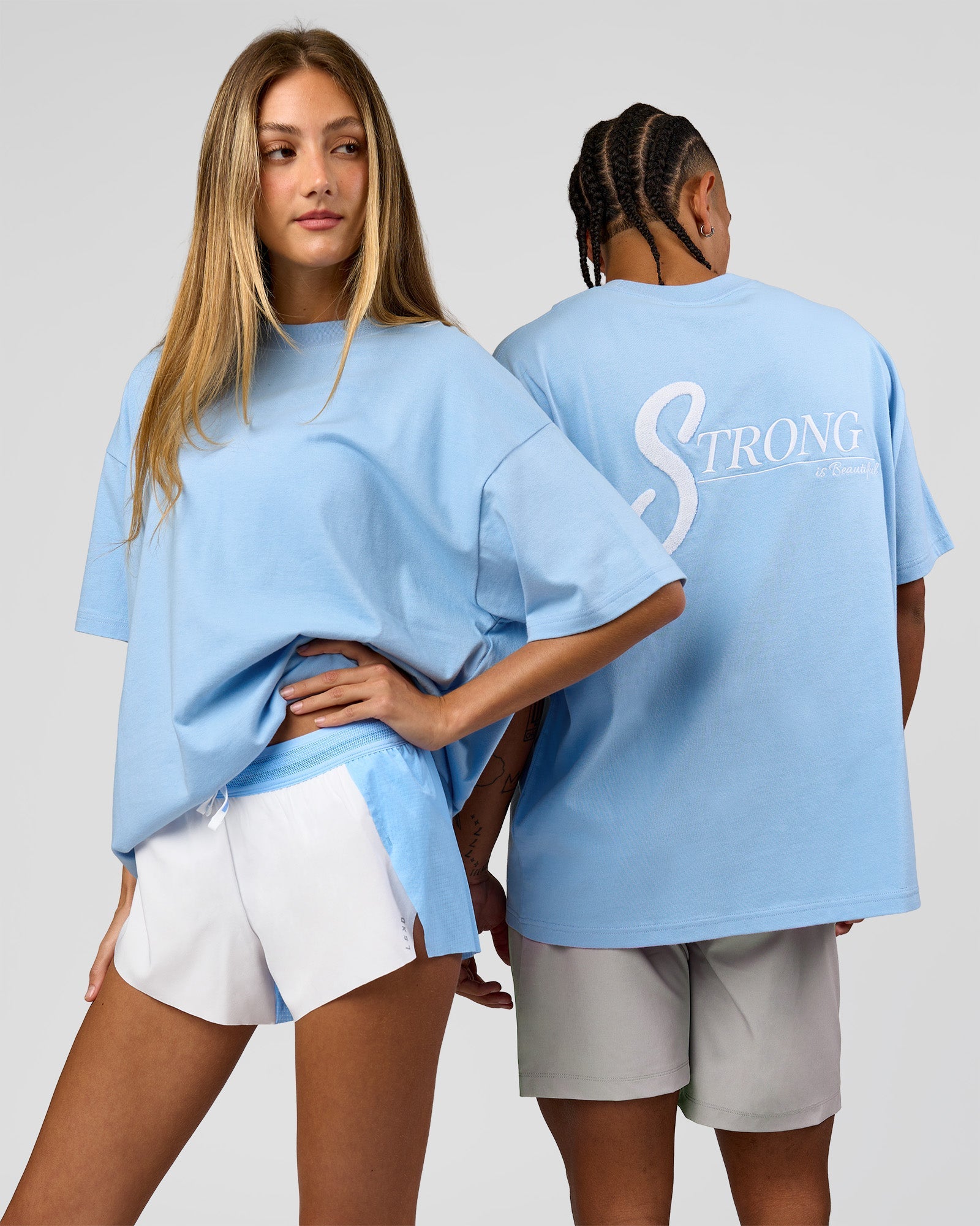 Duo wearing Strong is Beautiful Heavyweight Oversized Tee - Open Air | Model:Georgia | Size:XS | Model:Malebo | Size:M