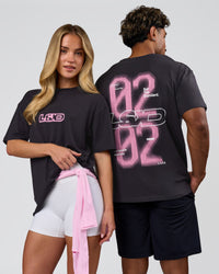Duo wearing SoCal 26 FLXCotton Oversize Tee  - Onyx-Pink Rose | Model:Issy | Size:XS | Model:Xav | Size:L | Thumbnail Index: 0