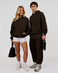 Duo wearing Base Oversized Hoodie - Ground Coffee | Model:Issy | Size:XS | Model:Leandro | Size:M | Thumbnail Index: 3