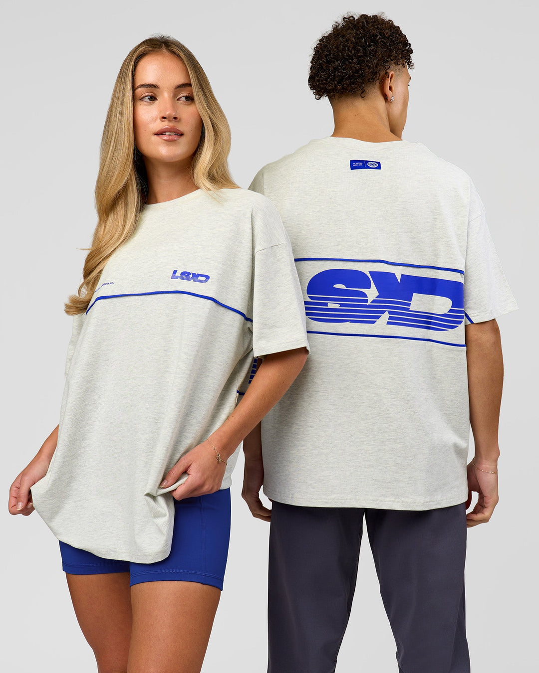 Duo wearing Inline Heavyweight FLXCotton Oversized Tee - Silver Marl-Power Cobalt | Model:Issy | Size:XS | Model:Leandro | Size:M - view 1