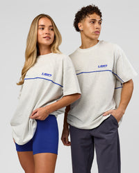 Duo wearing Inline Heavyweight FLXCotton Oversized Tee - Silver Marl-Power Cobalt | Model:Issy | Size:XS | Model:Leandro | Size:M | Thumbnail Index: 1