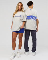 Duo wearing Inline Heavyweight FLXCotton Oversized Tee - Silver Marl-Power Cobalt | Model:Issy | Size:XS | Model:Leandro | Size:M | Thumbnail Index: 2