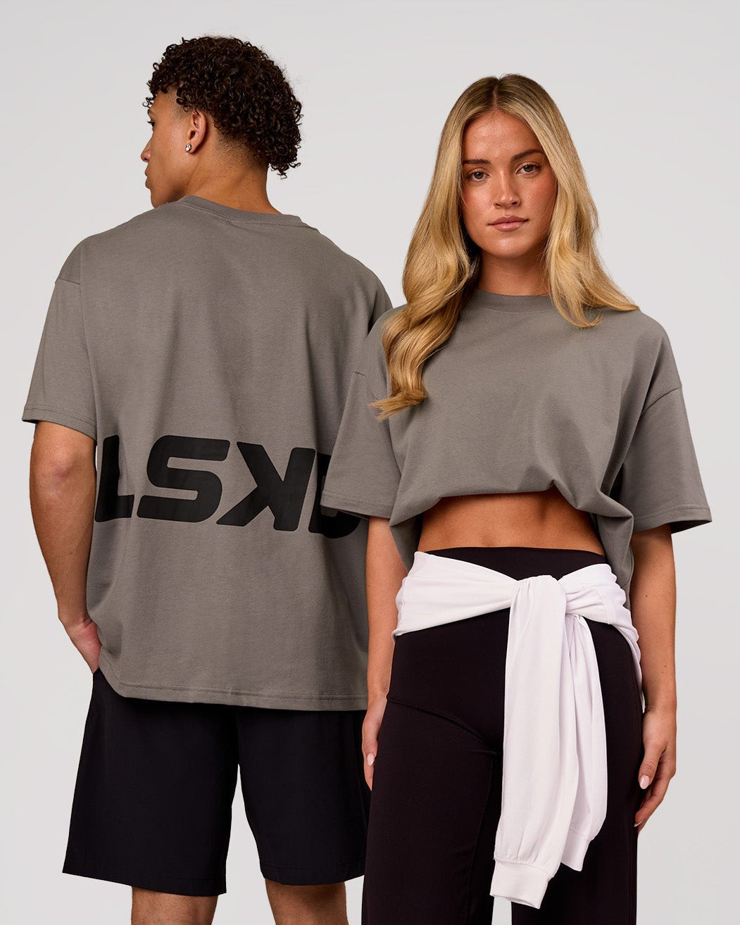 Duo wearing Shadow Mark Heavyweight Oversized Tee - Storm Front-Onyx | Model:Issy | Size:XS | Model:Leandro | Size:M - view 1