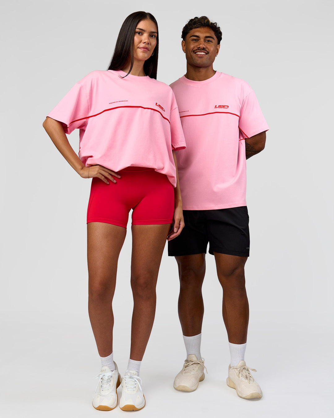 Duo wearing Inline Heavyweight FLXCotton Oversized Tee - Pink Rose-Flame | Model:Rhiley | Size:XS | Model:Xav | Size:L - view 4