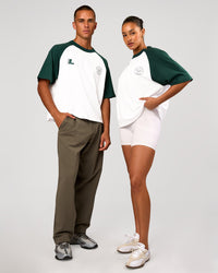 Duo wearing Victory Heavyweight Boxed Raglan Tee - White-Midnight Green | Model:Rosie | Size:XS | Model:Albert | Size:M | Thumbnail Index: 6
