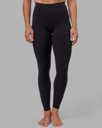 Woman wearing Fusion Ultra High-Rise Tall Legging Pockets - Black | Model:Bree | Size:S