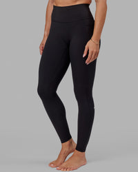 Woman wearing Fusion Ultra High-Rise Tall Legging Pockets - Black | Model:Bree | Size:S