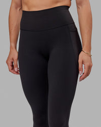 Woman wearing Fusion Ultra High-Rise Tall Legging Pockets - Black | Model:Bree | Size:S