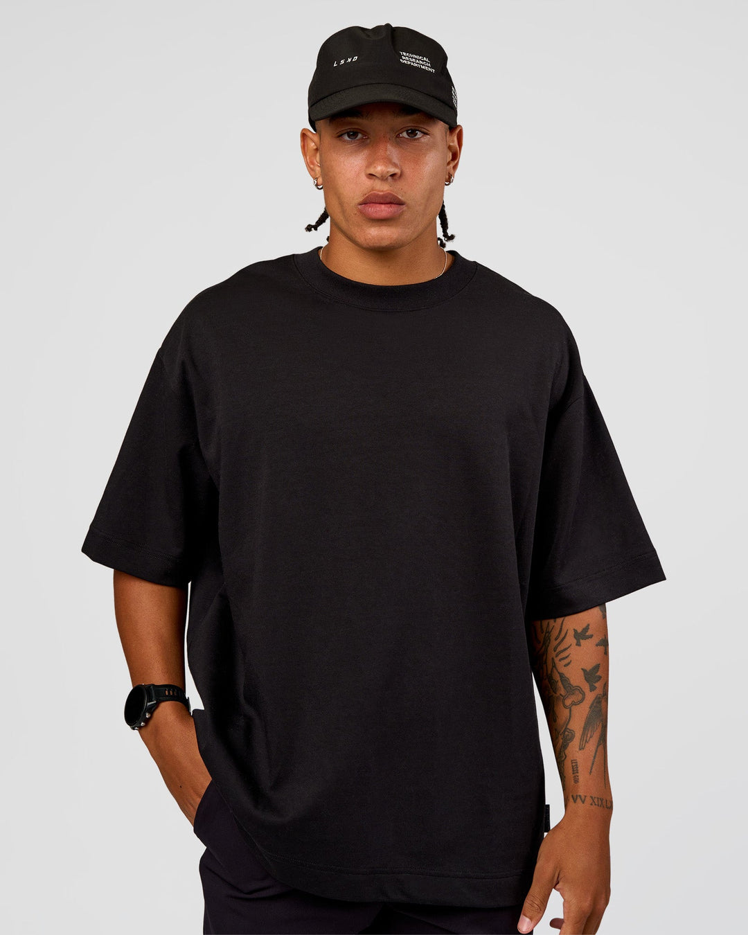 man wearing LSKD TRD CAP - Black-Off White