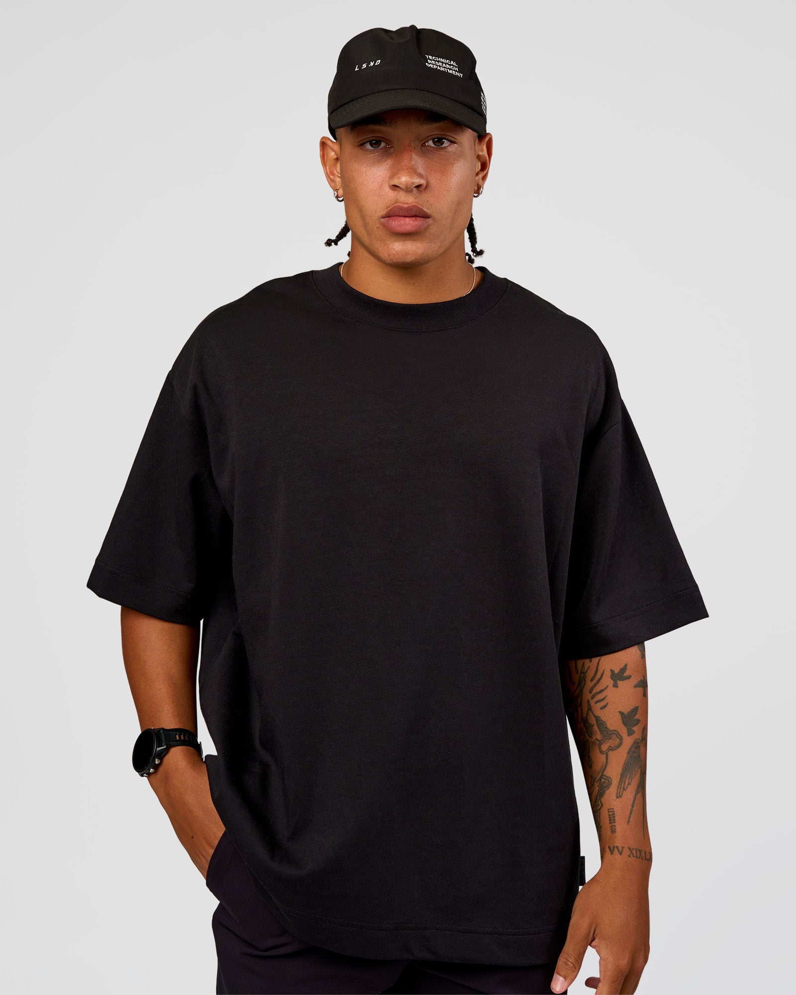 man wearing LSKD TRD CAP - Black-Off White