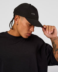 man wearing LSKD TRD CAP - Black-Off White