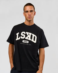 Man wearing Varsity EST Heavyweight Oversized Tee  - Black-Off White | Model:Albert | Size:L | Thumbnail Index: 0