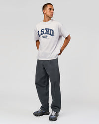 Man wearing Varsity EST Heavyweight Oversized Tee  - Silver Marl-Future Navy | Model:Albert | Size:L | Thumbnail Index: 2