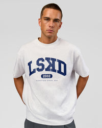 Man wearing Varsity EST Heavyweight Oversized Tee  - Silver Marl-Future Navy | Model:Albert | Size:L | Thumbnail Index: 9