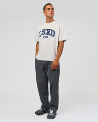 Man wearing Varsity EST Heavyweight Oversized Tee  - Silver Marl-Future Navy | Model:Albert | Size:L | Thumbnail Index: 13