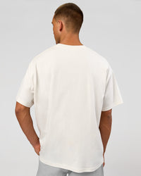 Man wearing Varsity EST Heavyweight Oversized Tee  - Off White-Future Navy | Model:Albert | Size:L | Thumbnail Index: 9