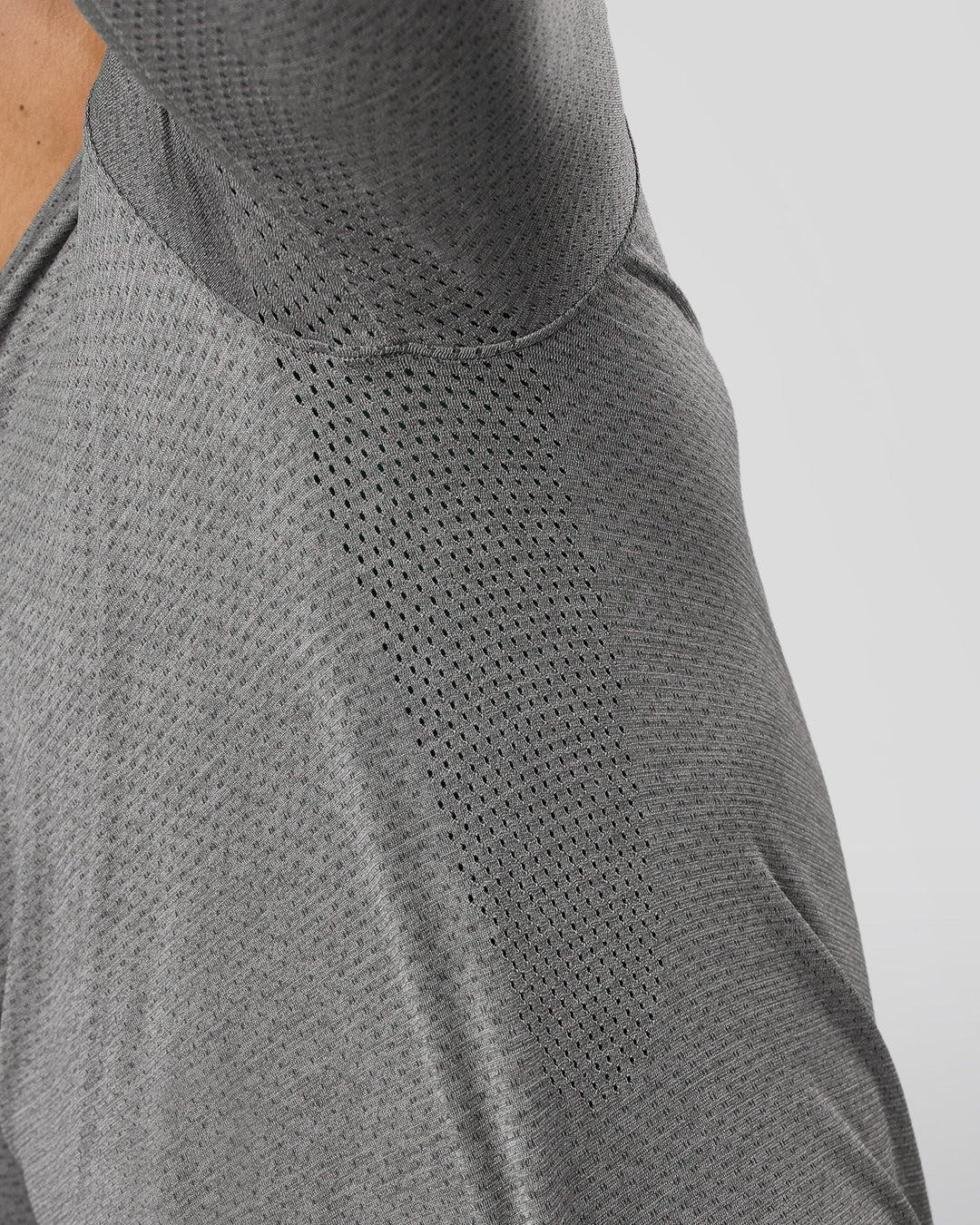 Man wearing AeroFLX+ Seamless Long Sleeve Tee (Set in Sleeve) - Dark Storm/Alloy | Model:Jaiden | Size:L - view 11