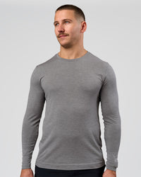 Man wearing AeroFLX+ Seamless Long Sleeve Tee (Set in Sleeve) - Dark Storm/Alloy | Model:Jaiden | Size:L | Thumbnail Index: 12