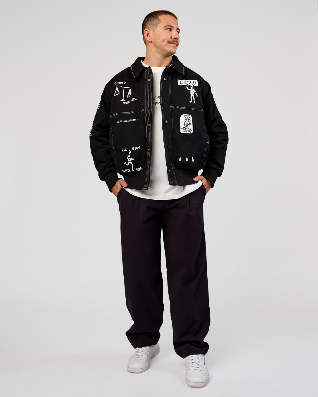 Man wearing Andrew J. Steel x LSKD Bomber Jacket - Black | Model:Jaiden | Size:L - view 15
