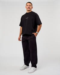 Man wearing Andrew J. Steel x LSKD Heavyweight Boxed Tee - Black | Model:Jaiden | Size:L | Thumbnail Index: 9