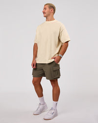 Man wearing Bree Heavyweight Oversized Tee - Vanilla Bean | Model:Jaiden | Size:L | Thumbnail Index: 5