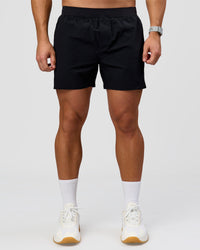 Man wearing Hybrid Lined 5" Short - Black-Reflective | Model:Jaiden | Size:L | Thumbnail Index: 5