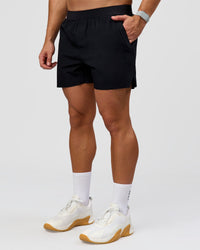 Man wearing Hybrid Lined 5" Short - Black-Reflective | Model:Jaiden | Size:L | Thumbnail Index: 8