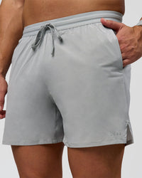 Man wearing Pace 5" Lined Running Short - Alloy | Model:Jaiden | Size:L | Thumbnail Index: 1