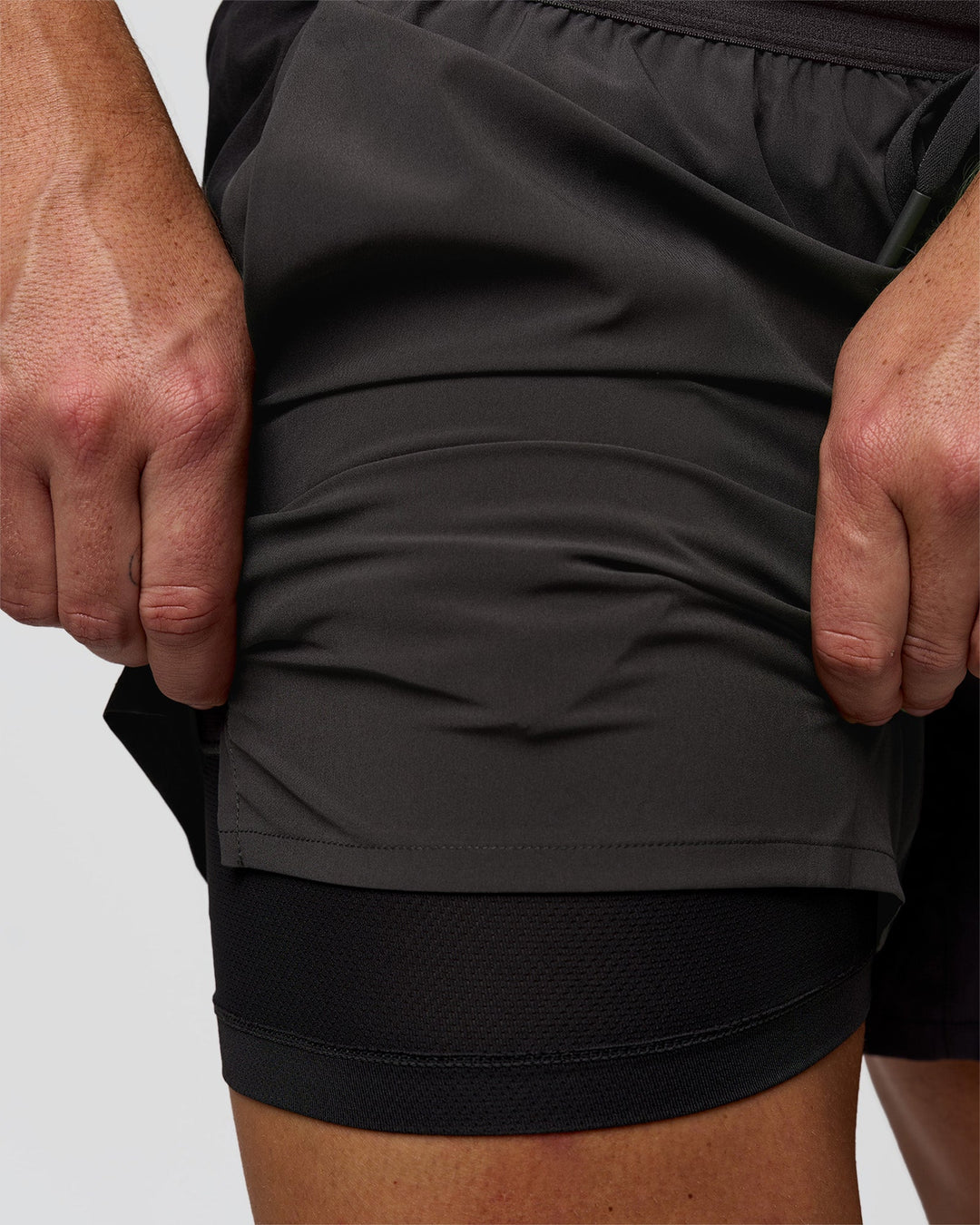 Man wearing Pace 5" Lined Running Short - Black-Onyx | Model:Jaiden | Size:L - view 14