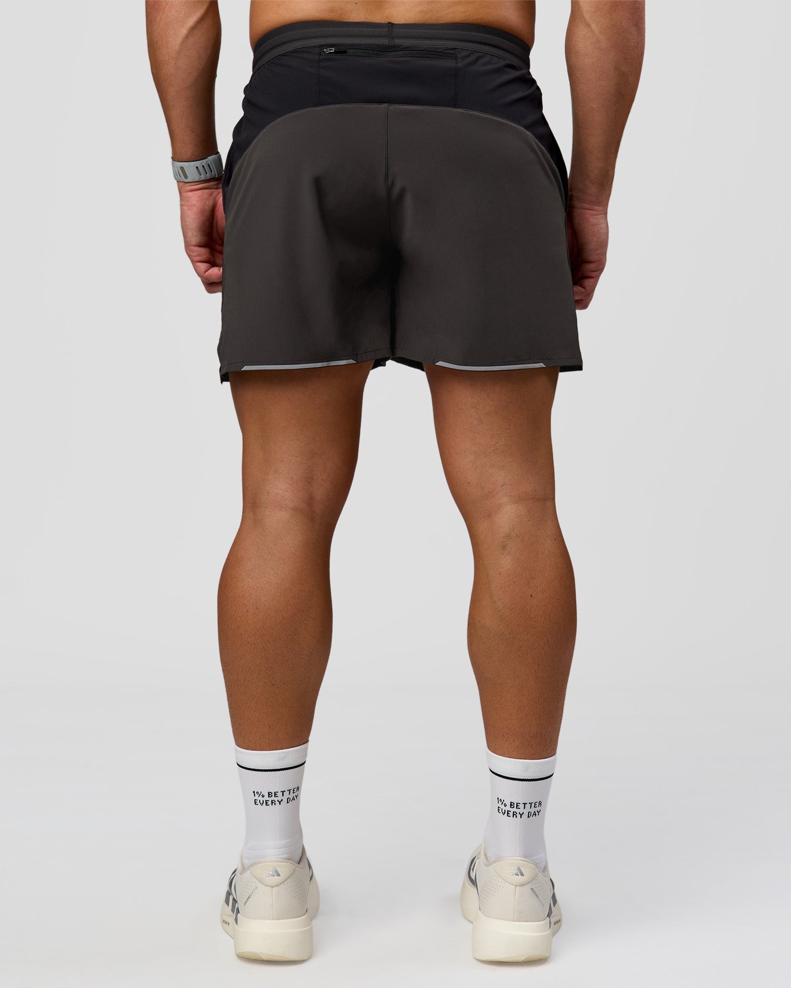 Man wearing Pace 5" Lined Running Short - Black-Onyx | Model:Jaiden | Size:L