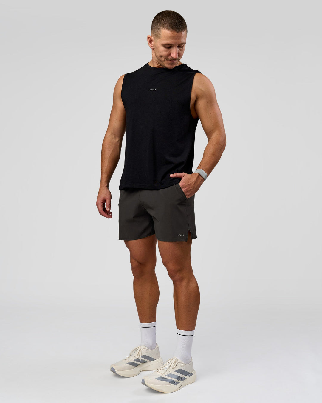 Man wearing Pace 5" Lined Running Short - Black-Onyx | Model:Jaiden | Size:L - view 8
