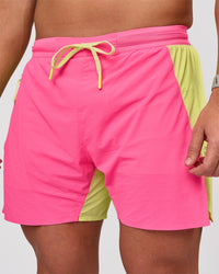 Man wearing UltraAir 5" Lined Performance Short - Sugar Plum-Lime Glo | Model:Jaiden | Size:L | Thumbnail Index: 0