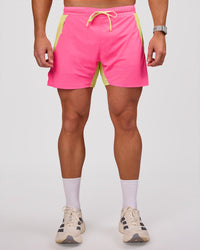 Man wearing UltraAir 5" Lined Performance Short - Sugar Plum-Lime Glo | Model:Jaiden | Size:L | Thumbnail Index: 3