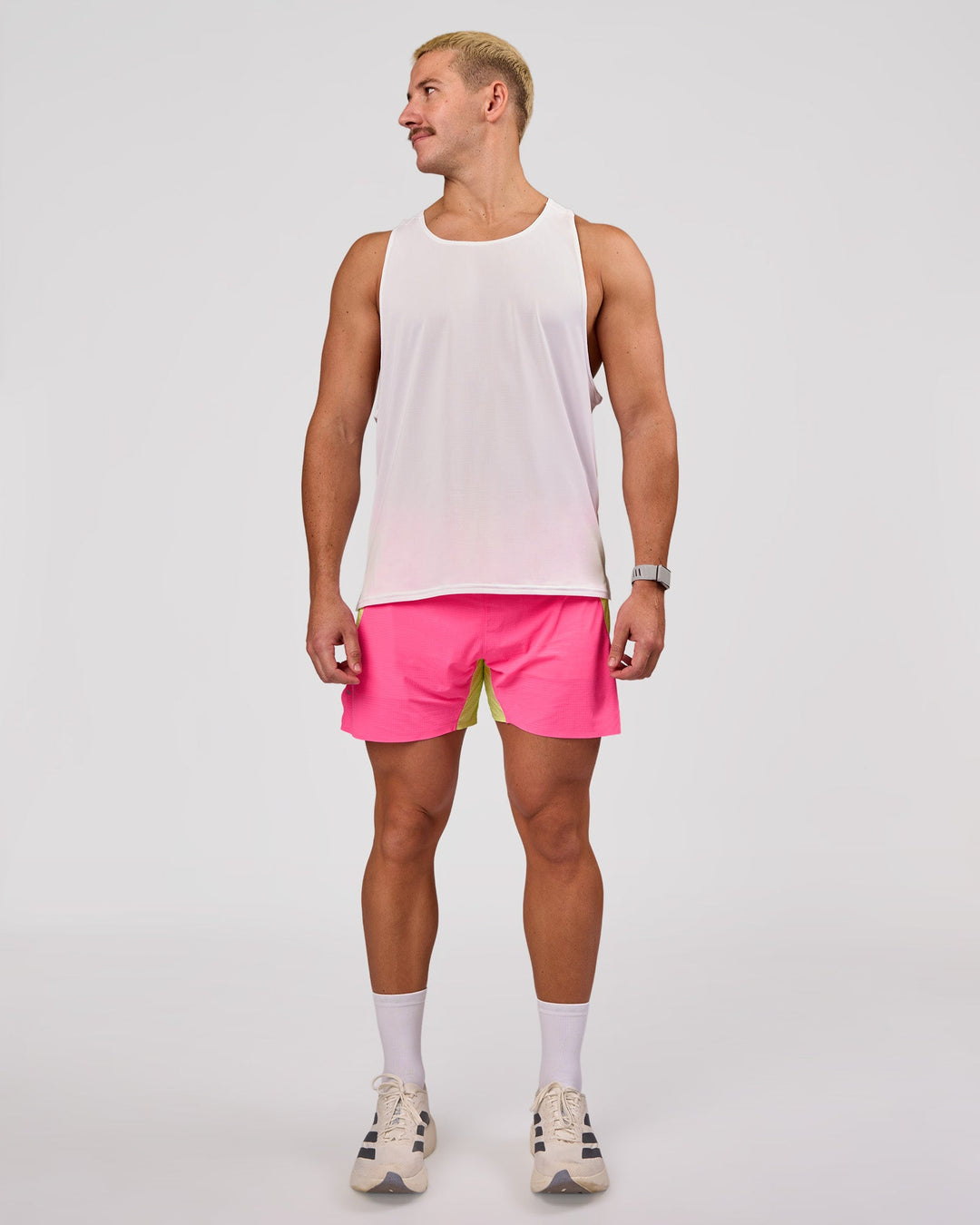 Man wearing UltraAir 5" Lined Performance Short - Sugar Plum-Lime Glo | Model:Jaiden | Size:L - view 6