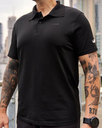 Man wearing Movember x LSKD Drive Seamless Polo - Black | Model:Macca | Size:L | Thumbnail Index: 3