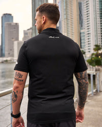 Man wearing Movember x LSKD Drive Seamless Polo - Black | Model:Macca | Size:L | Thumbnail Index: 4