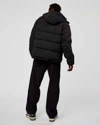 Man wearing Base Puffer Jacket - Black | Model:Okello | Size:L | Thumbnail Index: 3